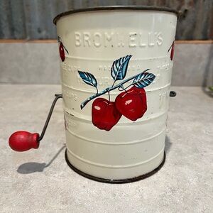 Cream and Red Flour Sifter
